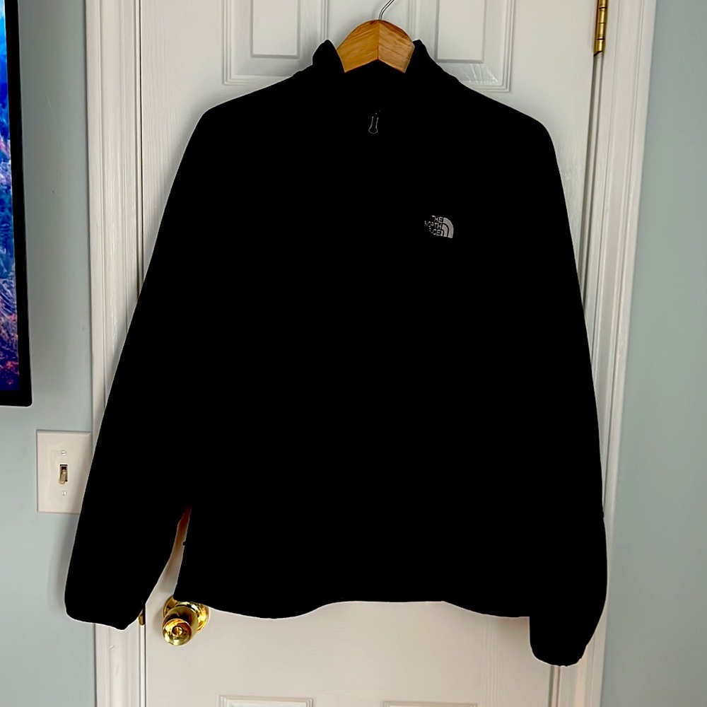 Black North Face soft jacket.